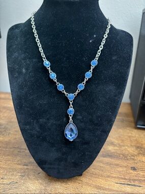 1928 Silver-Tone Necklace with Deep Blue Round Accents and Teardrop